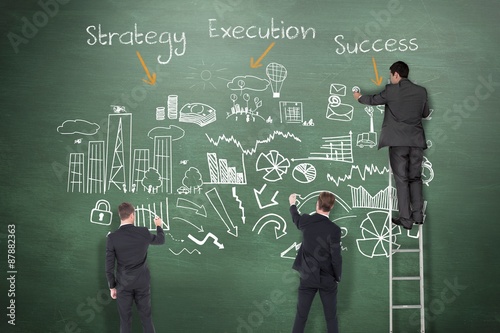 Fotografía Composite image of business team writing