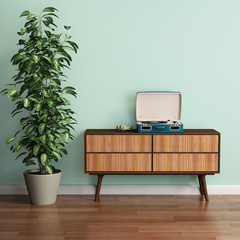 Light green interior with mid century chair and a vintage turntable