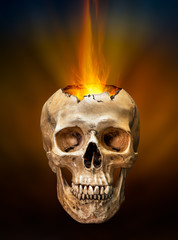 Wall Mural - Beam of fire blaze from broken human skull