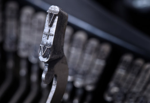 V hammer - old manual typewriter - cold blue filter