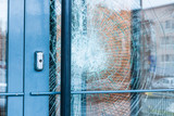 Fototapeta Desenie - Broken glass front door