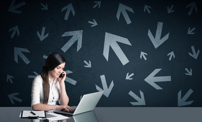 Canvas Print - businesswoman with arrows in background