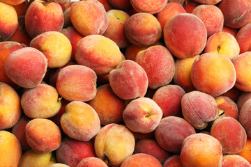 Ripe peach fruit background, close up