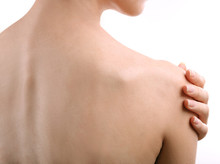 Young Woman With Shoulder Pain Close Up