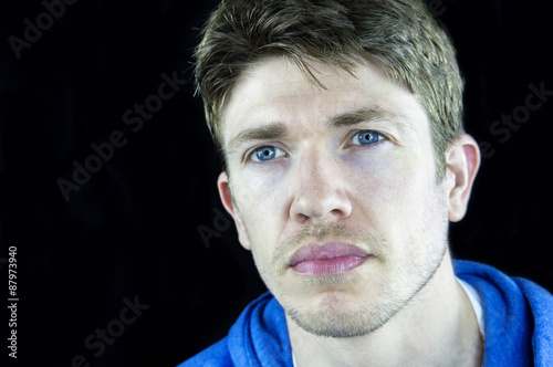 Headshot Of A Young Man With Blue Eyes Brown Hair And White