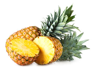 Pineapple with slices isolated on white