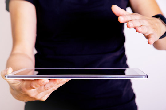 Hand holding Tablet PC