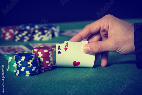 Fotografija Closeup of poker player with two aces