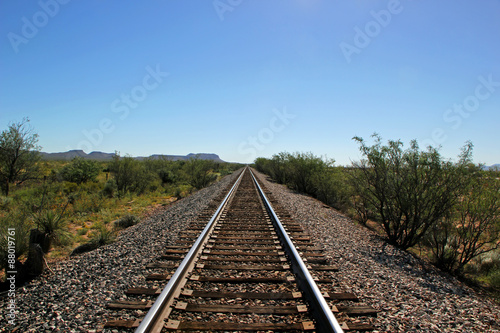 Fotografie, Obraz Railroad Tracks Go on for Miles in West Texas