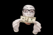 Portrait of  mime in white gloves  with 10 dollar denomination