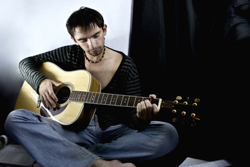 young man with a guitar