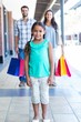 © WavebreakmediaMicro - Happy family with shopping bags