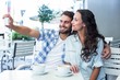 © WavebreakmediaMicro - Young happy couple making a selfie