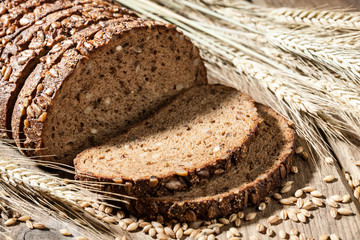 Rye bread with seeds on a wooden table