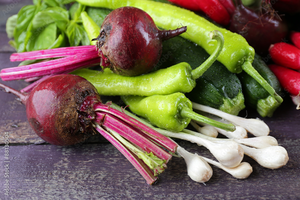 Heap of fresh vegetables on table close up
