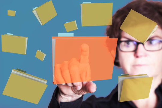 Woman typing on office storage
