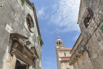 Two churches on San Marco square in medieval town Korcula on island Korcula, Croatia