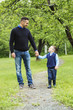 © Louis-Paul Photo - Father and son in forest on a meadow