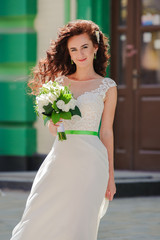 Wall Mural - Bride walking alone among the Kiev's buildings