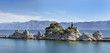Rocks with statue of St. Mary at small adriatic port Trpanj on Peljesac peninsula in Dalmatia, Croatia