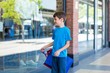 © WavebreakmediaMicro - Young boy playing with shopping bags