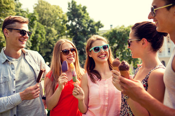Wall Mural - group of smiling friends with ice cream outdoors