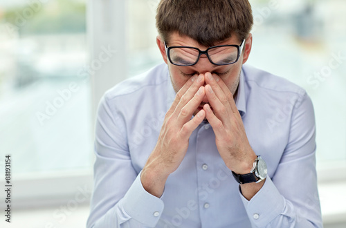 Fotografie, Obraz tired businessman with eyeglasses in office