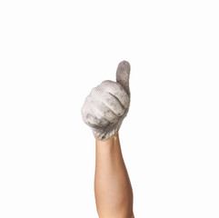 Wall Mural - hand in  dirty work gloves with thumb up isolated on white backg