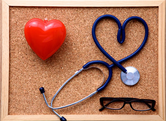 Medical stethoscope on a background of cork panels