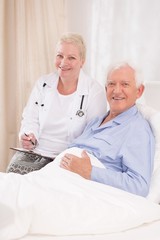 Wall Mural - Caring doctor and her patient