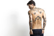 © patronestaff - Sexy tattooed man back portrait
