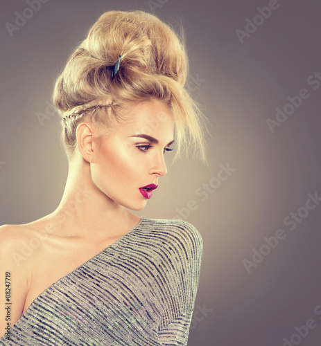 Fototapeta na wymiar High fashion model girl portrait with updo hairstyle
