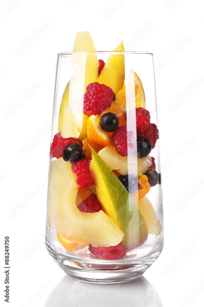 Fresh fruits salad in glass isolated on white