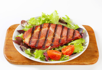 Wall Mural - Grilled pork with salad greens