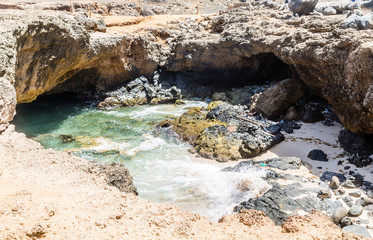 Canvas Print - Water Flowing Under Natural Bridge