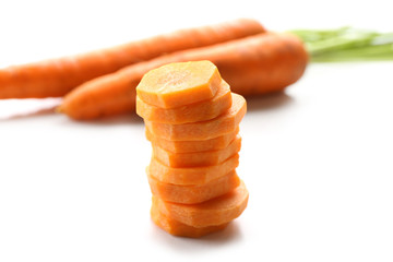 Wall Mural - Sliced carrot isolated on white