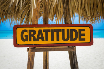 Wall Mural - Gratitude sign with beach background