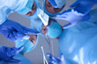 © lenets_tan - Surgeons holding medical instruments in hands and looking at