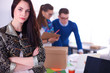 © lenets_tan - Young business people working at office on new project