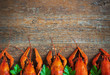 Boiled crayfish on a wooden background.