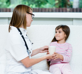 Sticker - doctor gives to drink to the sick child