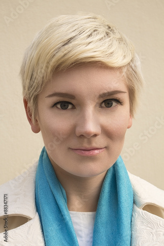 Stylish Young Beautiful Woman Blonde In White Coat And Blue Scarf Fashion Hairstyle Haircut Short Hair Professional Nude Fresh Make Up Perfect Skin Buy This Stock Photo And Explore Similar Images At