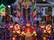 © martialred - Christmas outdoor Christmas decorations - Snowman and nutcracker lights up house in Brooklyn, New York