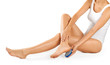 © vitals - Beautiful woman legs on a white background. Pedicure, peeling.
