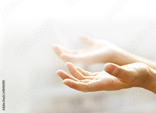 Fotografie, Obraz Human open empty hands with light background, blurred and soft