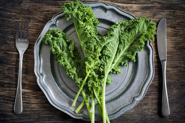 Canvas Print - Fresh Green Kale on plate. Healthy eating concept