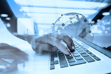 double exposure of businessman hand working with business docume