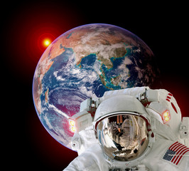 Wall Mural - astronaut spaceman isolated helmet outer space earth globe sunrise. elements of this image furnished