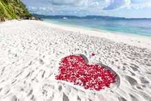 Heart Of Roses Petals On Sea Sand Beach