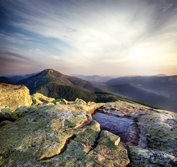 Wall Mural - water in the green stone on top of mountain